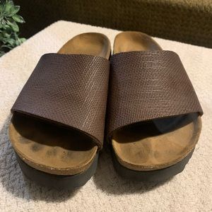 Brown Birki made by Birkenstock. Comfy and versatile.